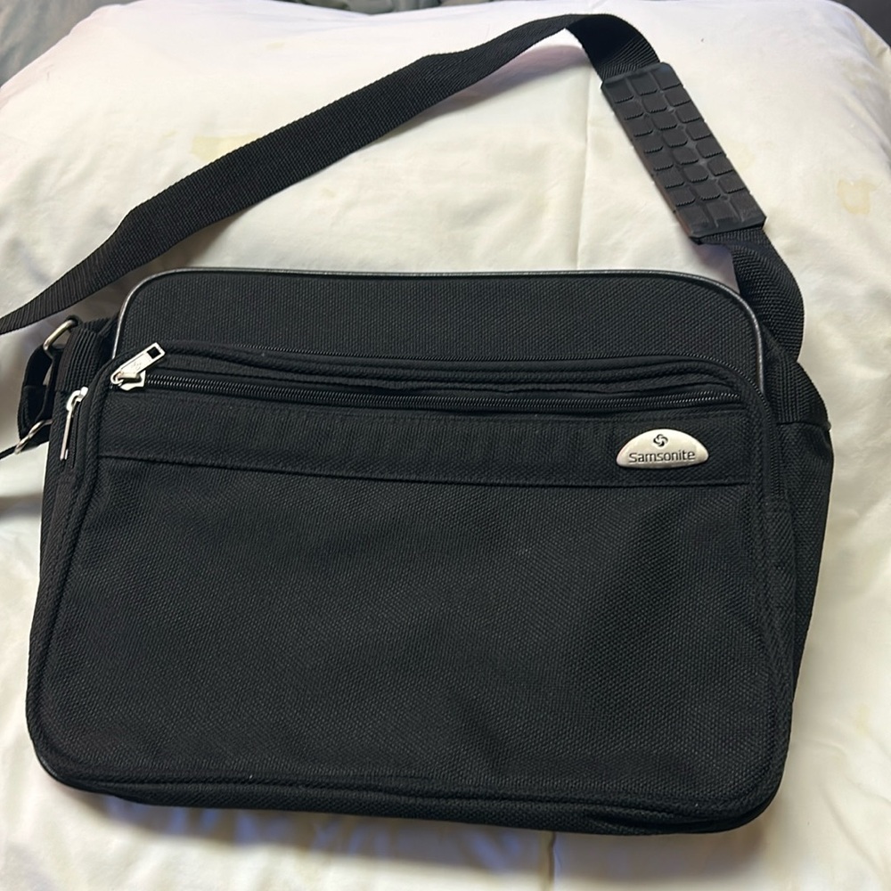 Samsonite black unisex canvas shoulder bag with adjustable strap